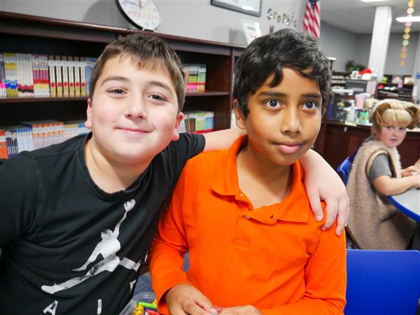 Students learning and having fun in Library.